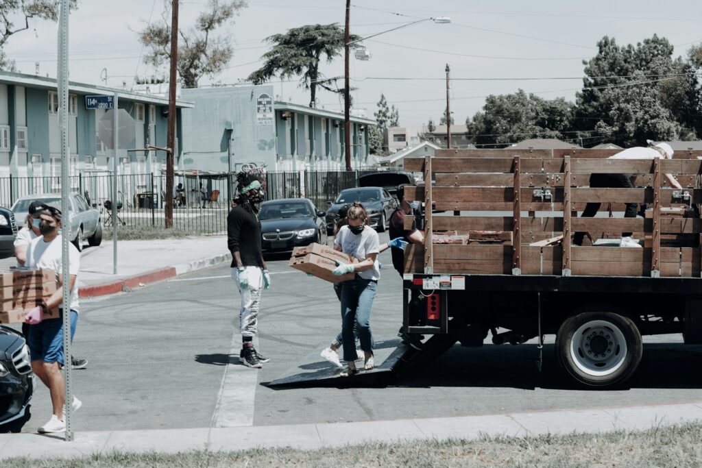 Volunteer loading supplies for distribution